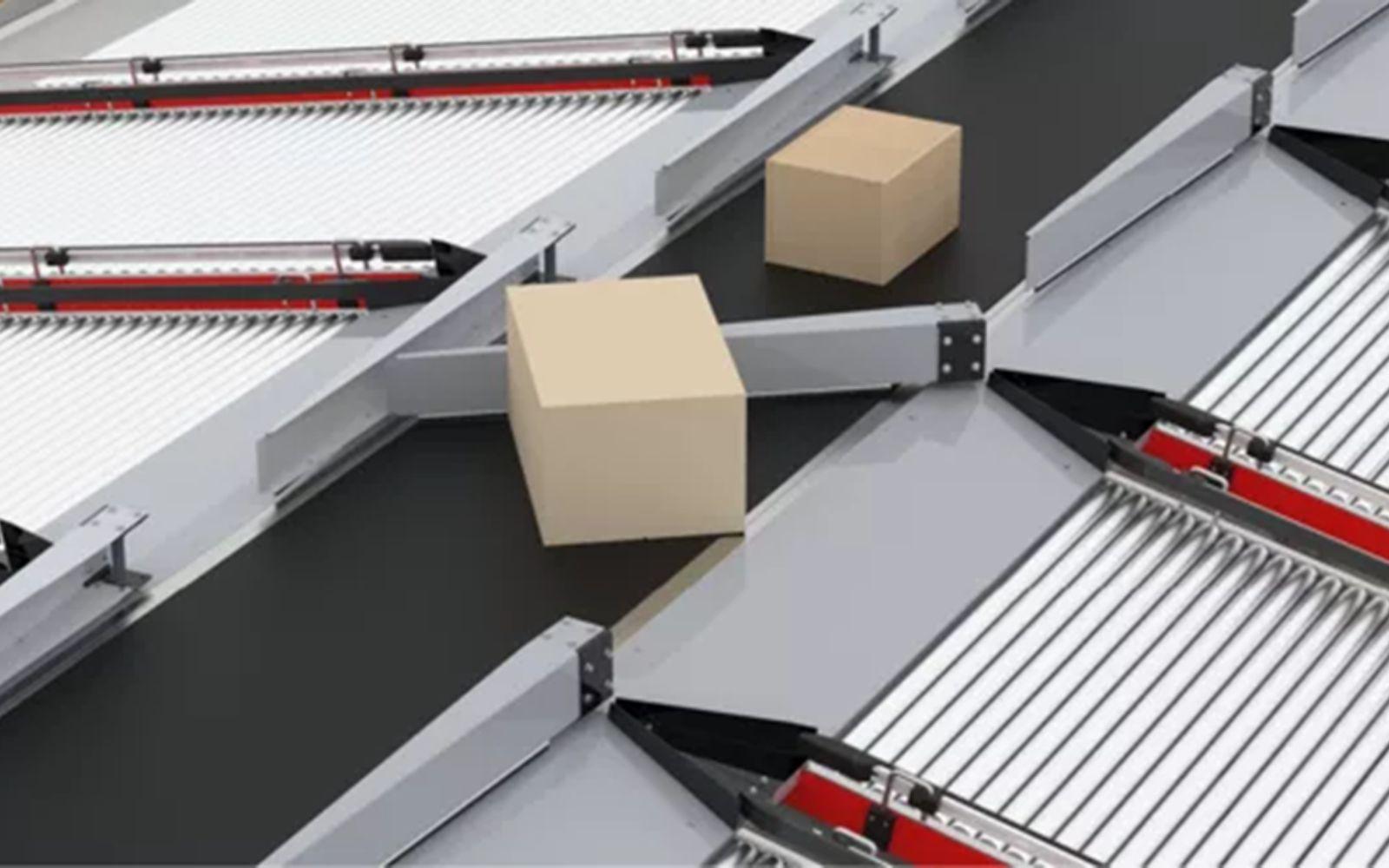 Plain cardboard boxes merging between two belt conveyors with roller sections